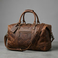 Distressed Leather Duffel Bag with Brass Hardware