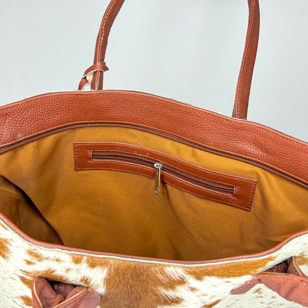 Tan And White Cowhide Leather Tote Bag with Tassel Accent